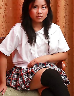 Cute Gelda strips from her school uniform to pleasure her pussy
